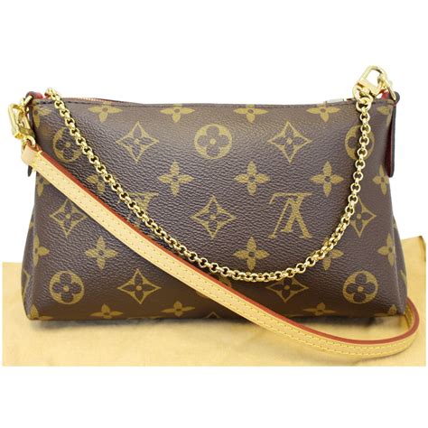 louis vuitton canvas clutch|authentic louis vuitton clutch.